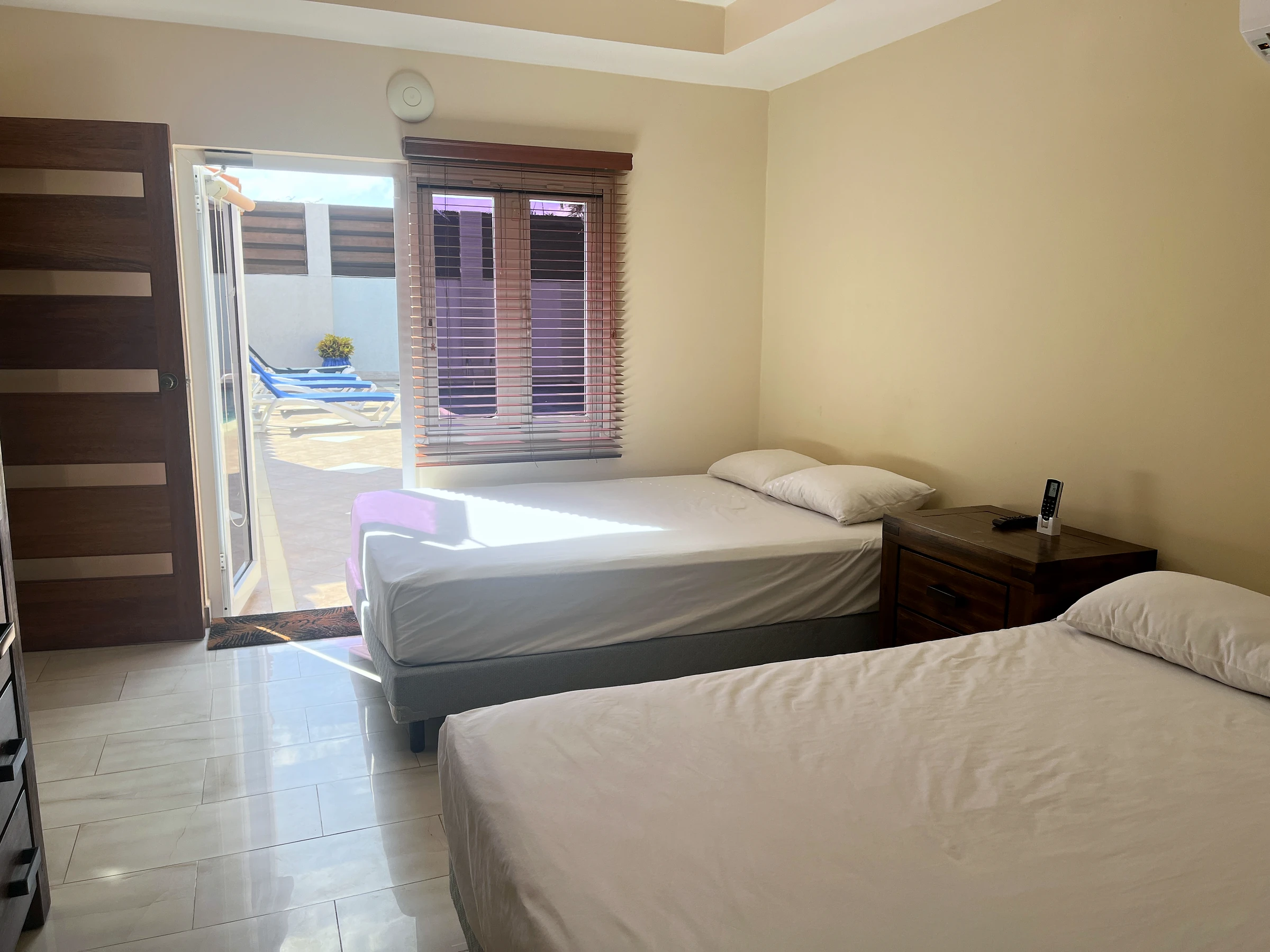 The bedroom with two queen beds